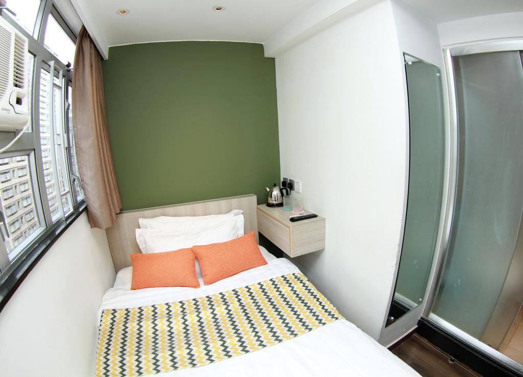 Move Inn Гонконг Номер фото