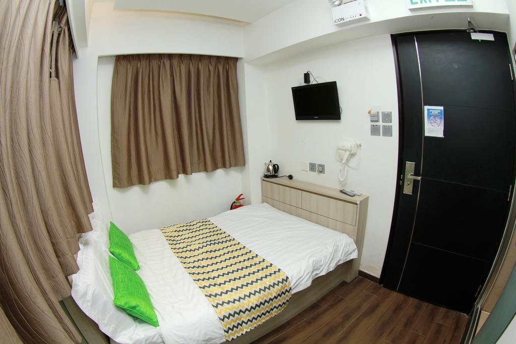 Move Inn Гонконг Номер фото
