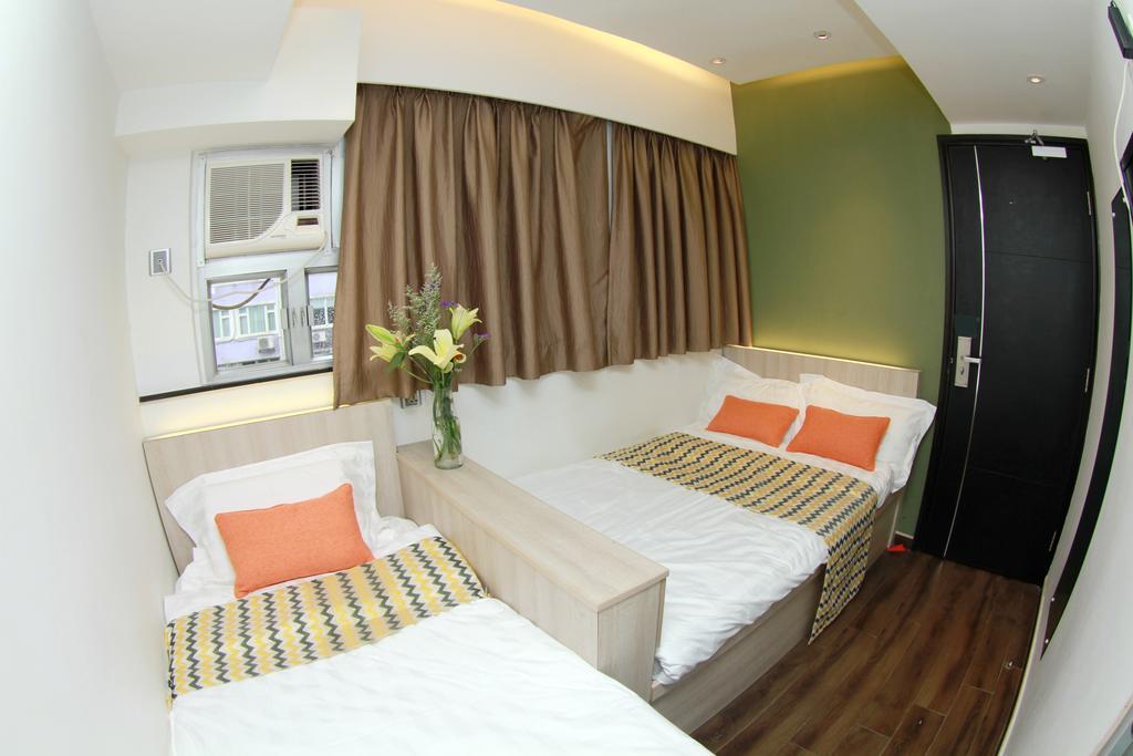Move Inn Гонконг Номер фото